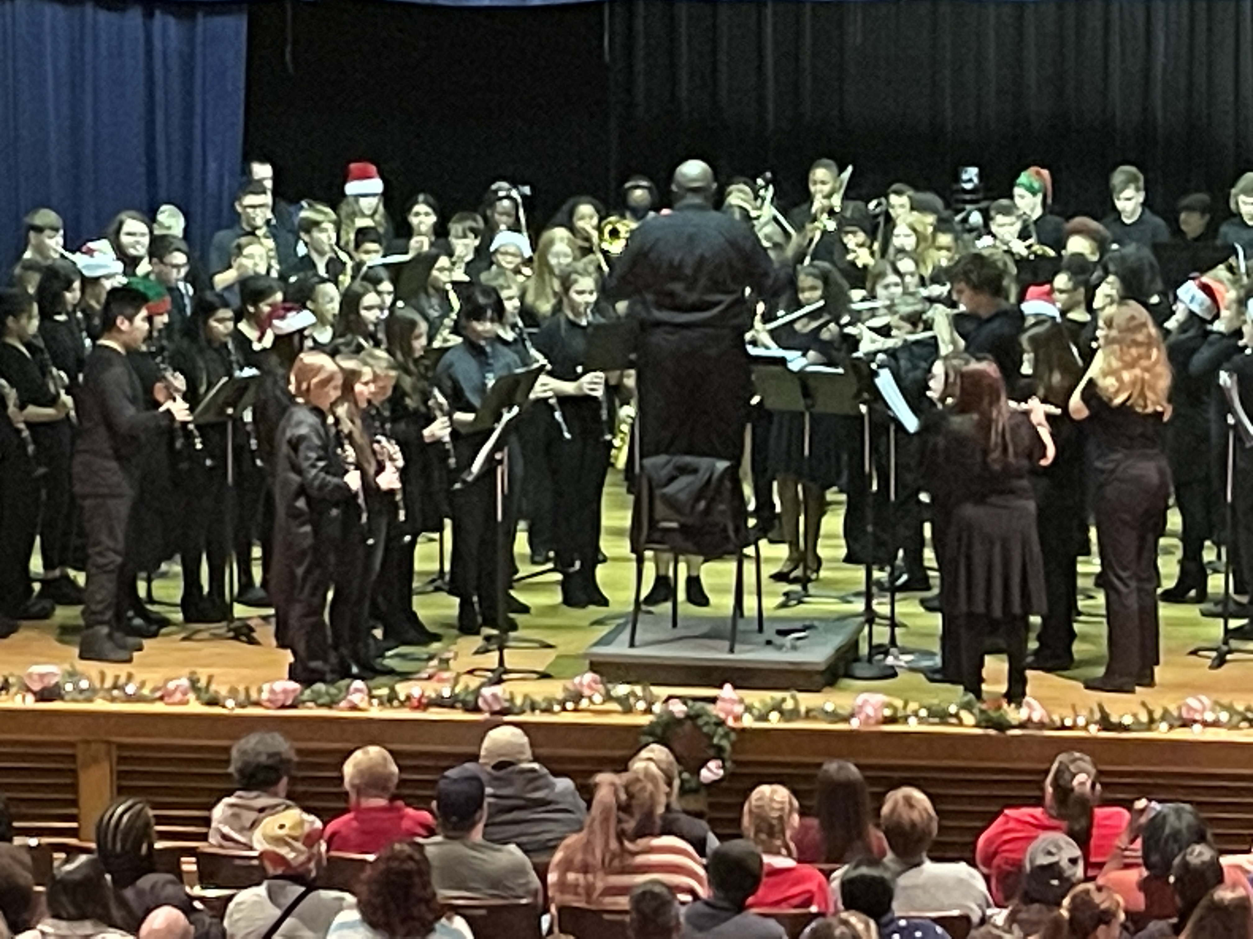 Mr. Reginald Smith leads the combined T.K. Stone band at their winter concert.